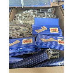 Collection of Hornby Dublo three-rail model railway rolling stock, track and accessories, some boxed