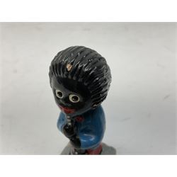 Robinson Jam plaster Golly band, including drummer and singer, H7.5cm

Originally handmade by mothers in Africa for their children from old fabric and cloth, the golly doll was adopted as the mascot and trademark for the Robertson's confectionery brand around 1910 after the company's founder John Robertson visited the US and noticed children playing with them. Robertson's Gollies have been collected by people across the UK and around the world for generations but garnered a contentious image in the 1980s because of links to racism. The trademark was removed from Robertson's branding in 2001.