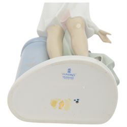 Four Lladro figures, comprising Loving Care no 6087, Young Nurse no 6307, Girl with Chicken no 4592 and Female Physician no 5197, three with original boxes 