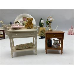 Collection of miniature dolls house furniture and accessories, to include four fabric topped tables, stand with jug and books, figural style table lamps, chairs, jardinière, Christmas themed furniture, etc