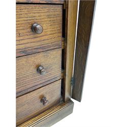 Victorian oak Wellington chest, fitted with seven drawers, lockable hinged side return