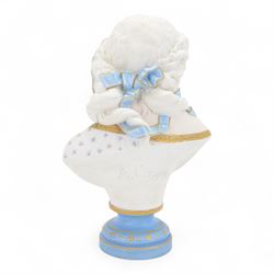 Late 19th century French Limoges bisque porcelain bust, by Henri Ardant, modelled as a young maiden with ribbon and rose in her hair, after A. Carrier, upon a blue socle base entitled 'Souvenir' in gilt, marked beneath, H37cm

