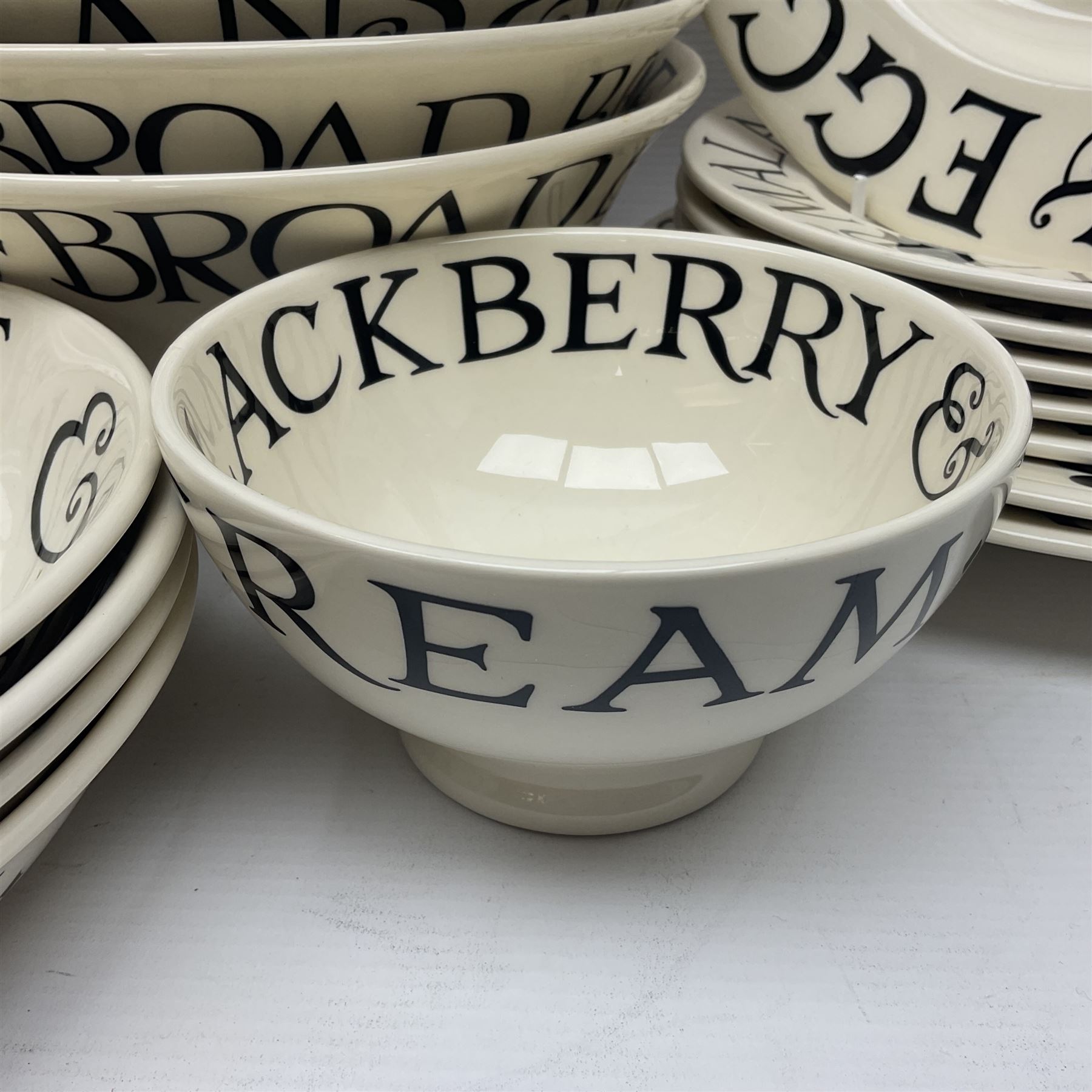 Emma Bridgewater part dinner service in Black Toast pattern, including six dinner plates, eight pasta plates in two sizes, ten side plates etc (31)