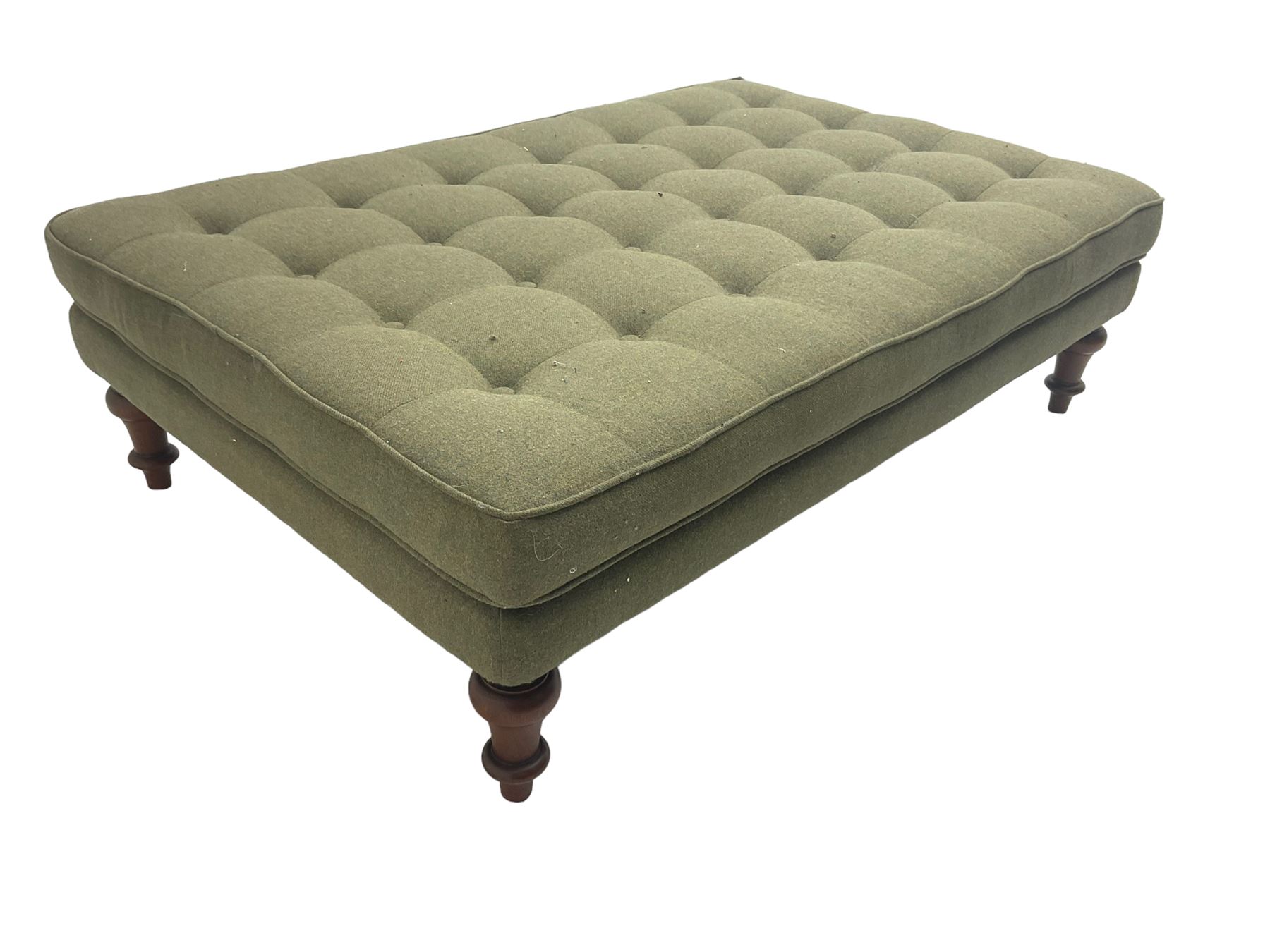 Peter Silk of Helmsley - large rectangular footstool upholstered in buttoned green tweed fabric, on turned mahogany feet