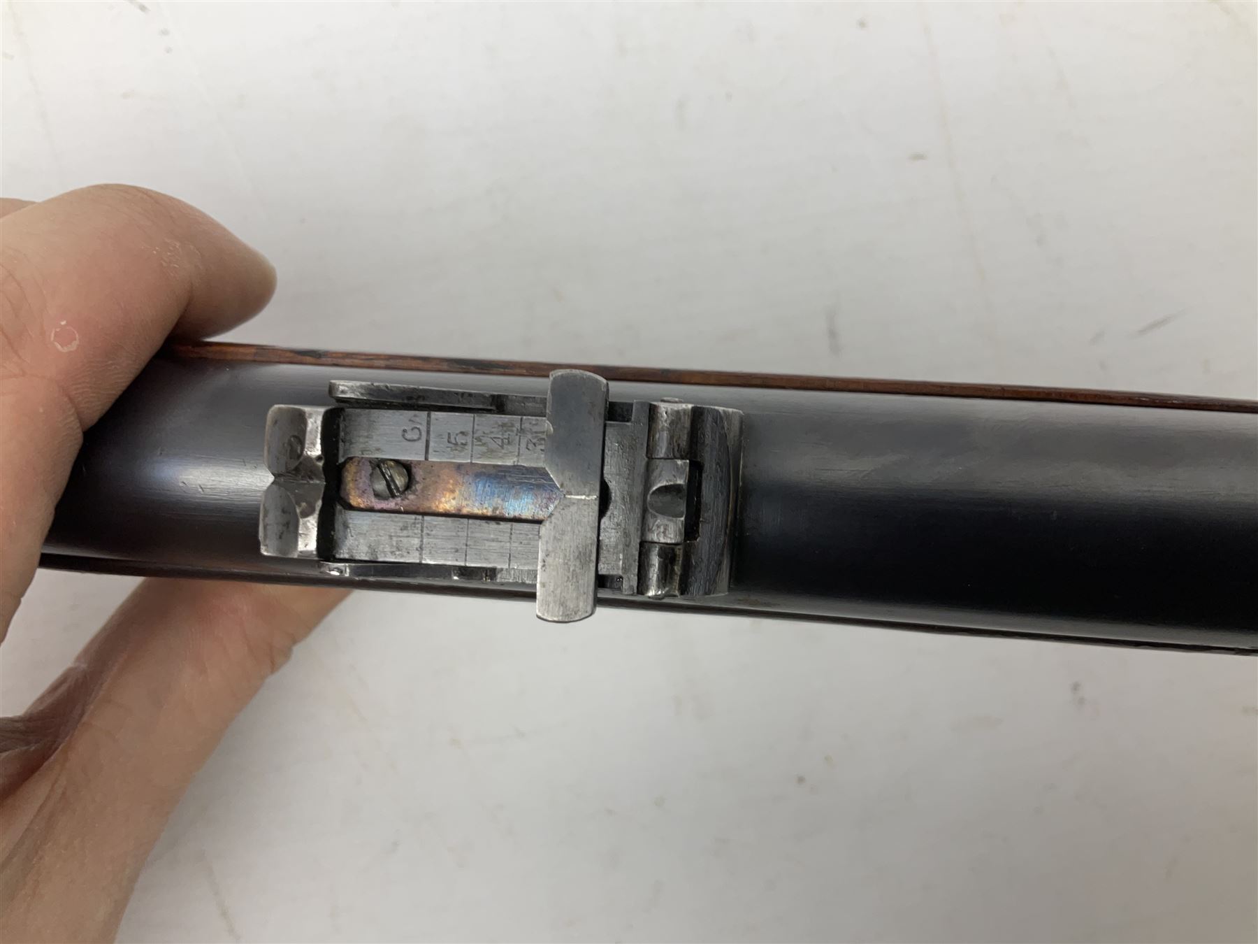 Westley Richards .310 Cadet Martini action rifle, the 63.5cm smooth bored barrel with one barrel band, walnut stock stamped 93/352 with hinged compartment to butt, serial no.3365, L103cm