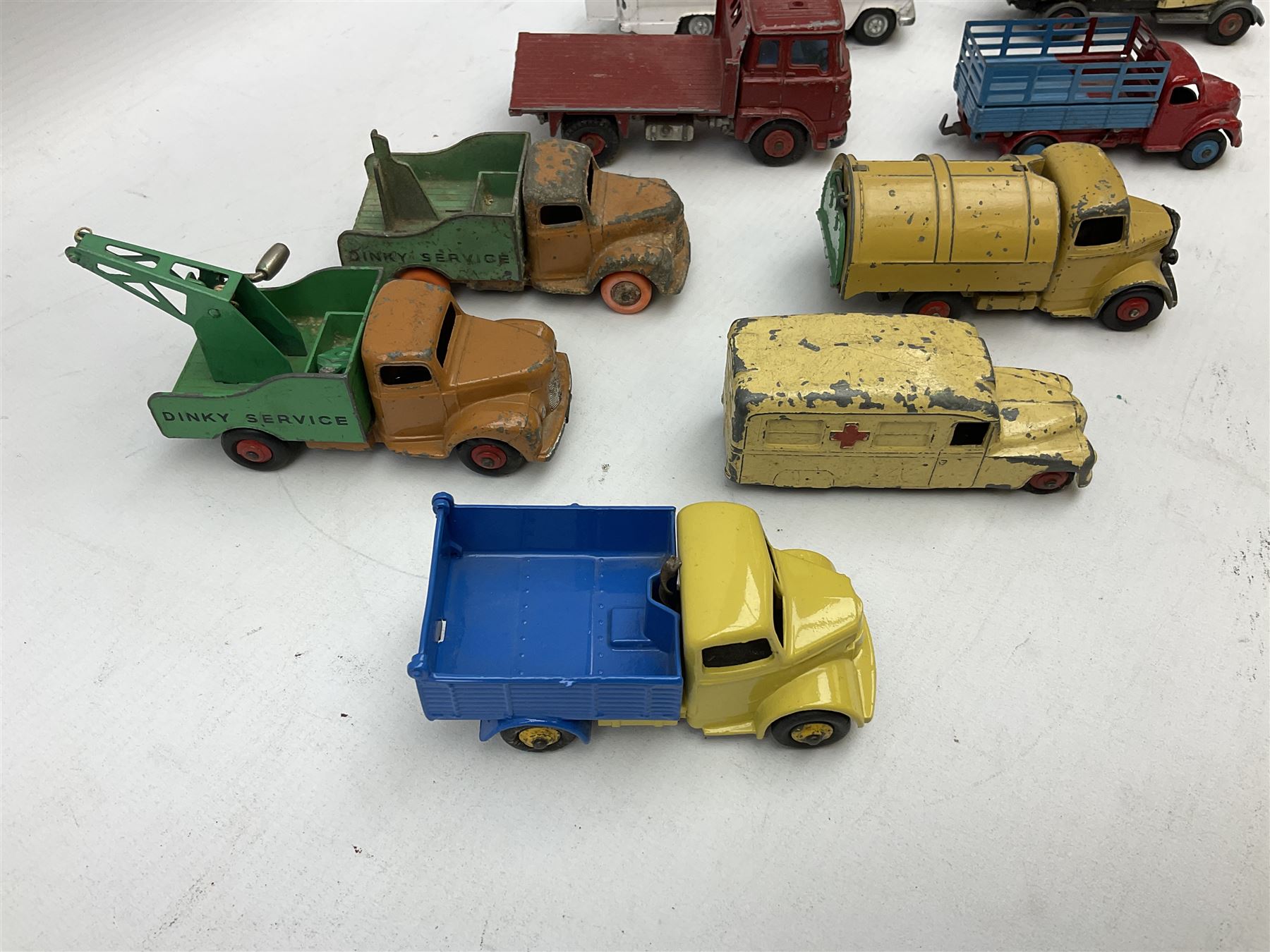 Dinky - twelve unboxed and playworn/repainted die-cast commercial vehicles including Hindle Smart Helecs, two Bedford tipper trucks, Dodge tipper truck, two Commer breakdown trucks, Brinks Armoured Car, Bedford Refuse wagon etc (12)