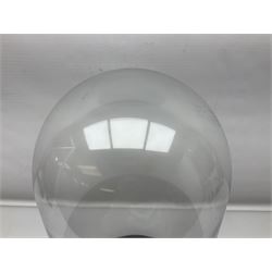 Glass dome upon circular base, H53cm