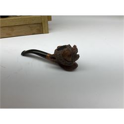 Pipes and two tiered wooden rack together with eleven pipers, including briar pipe carved as a wolf, Sea Dog straight pipe, John Brumfit pipe, meerschaum pipe ect, pipe rack H29.5cm