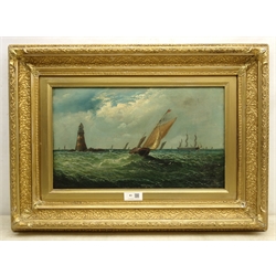  English School (19th century): Fishing Boat rounding the Lighthouse, oil on canvas indistinctly signed 29cm x 50cm  