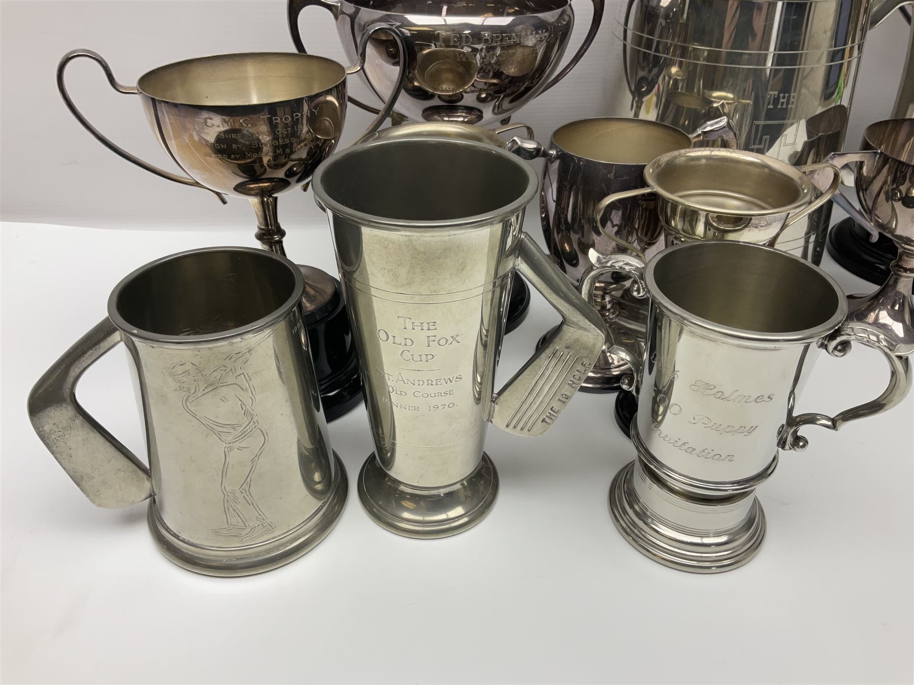Collection of pewter and silver-plated trophy cups and presentation tankards, largest H28cm
