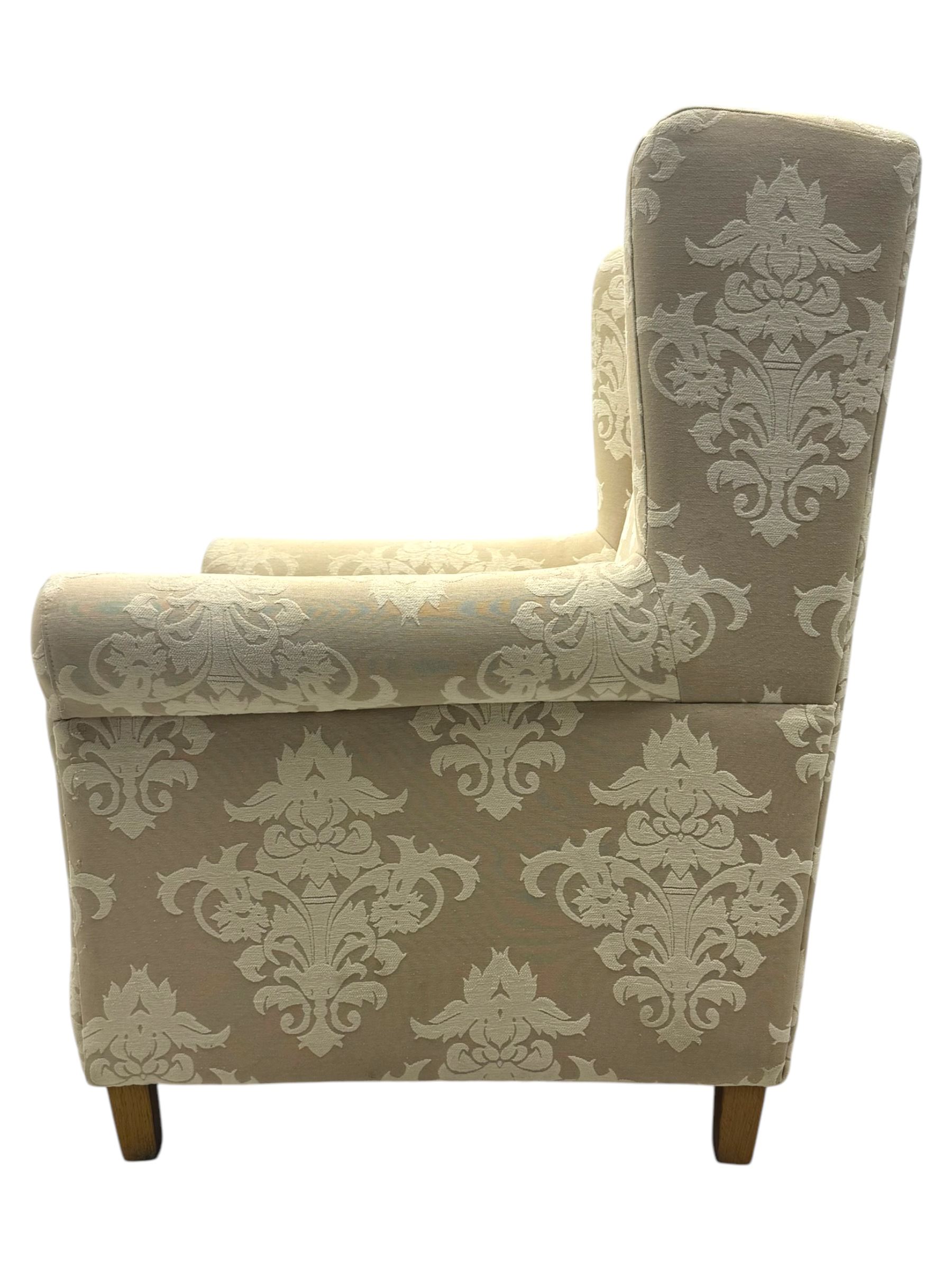Chatsworth hardwood-framed armchair upholstered in cream  damask, with rolled arms and cushioned seat, raised on square tapered feet