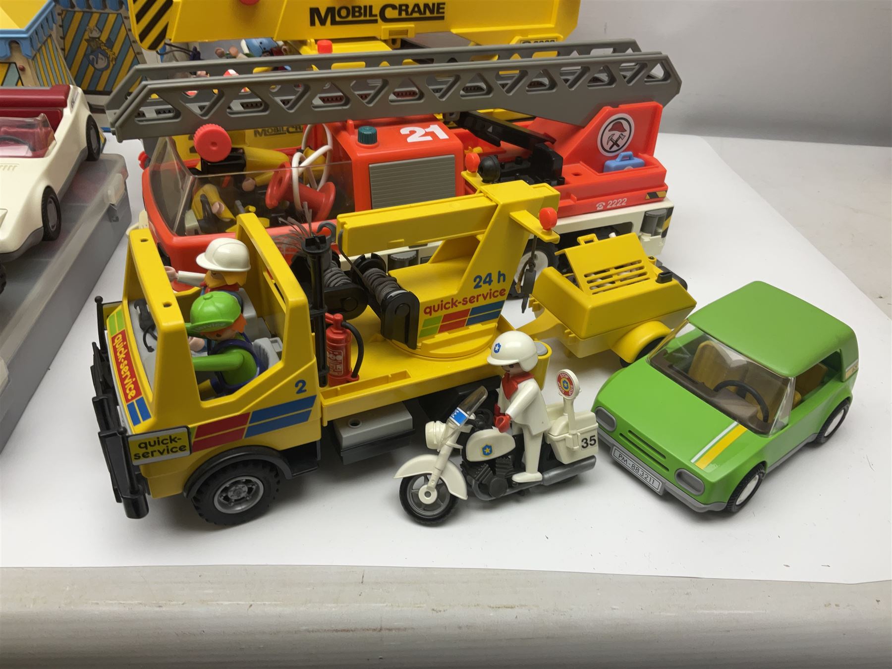 Collection of 1980s/90s Playmobil - vehicles including Fire-Engine No.21, Mobil Crane No.28, Quick Service Truck No.1 with trailer, Dumper Truck, GSL Sports car, GS Turbo car and three motorcycles; together with boxed Knights Tournament Set, Playmospace Space Station and Shuttle, wigwam and various accessories and figures etc