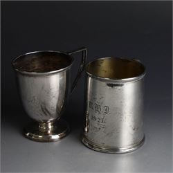 Two early 20th century silver christening mugs, both with engraved initials, both hallmarked, tallest H7.5cm