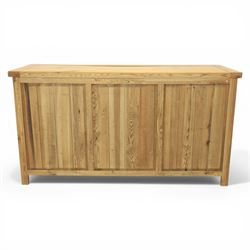 Modern light oak sideboard, fitted with six drawers and two cupboards