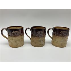 Set of three Victorian  salt-glazed tankards, decorated in relief with hunting scenes within a landscape, H14cm