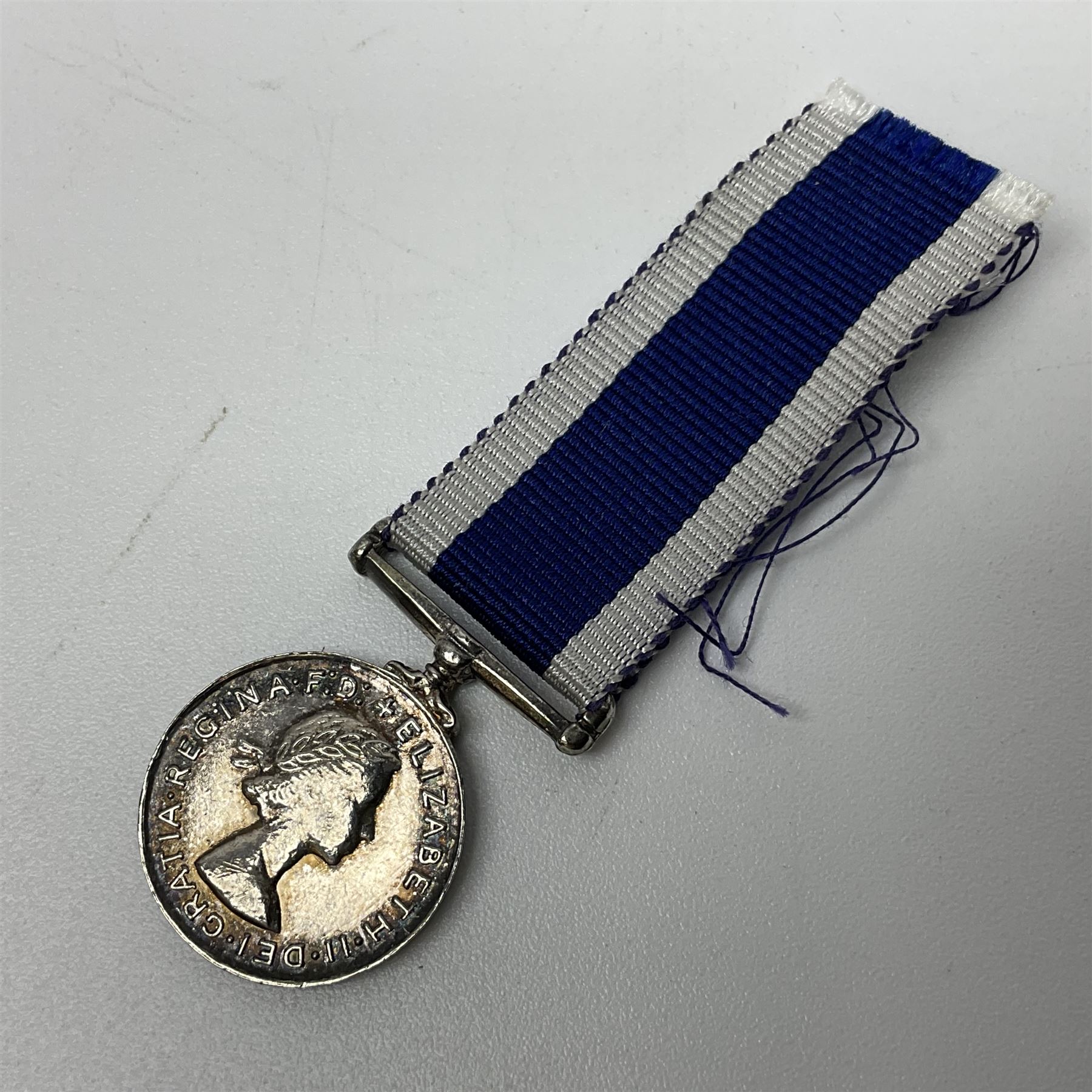 Eleven WW2 medals comprising three 1939-1945 war medals, two Defence medals, three 1939-1945 Stars, Atlantic Star, Africa Star and Italy Star; miniature QEII Naval LS & GC medal; all with ribbons; and WW2 postumous medal slip to Flight Sergeant L.N. Clark
