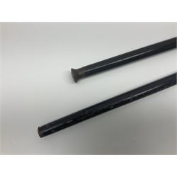 Two ebonised walking sticks, one with 'Leeds City Police' embossed top, tallest H92cm