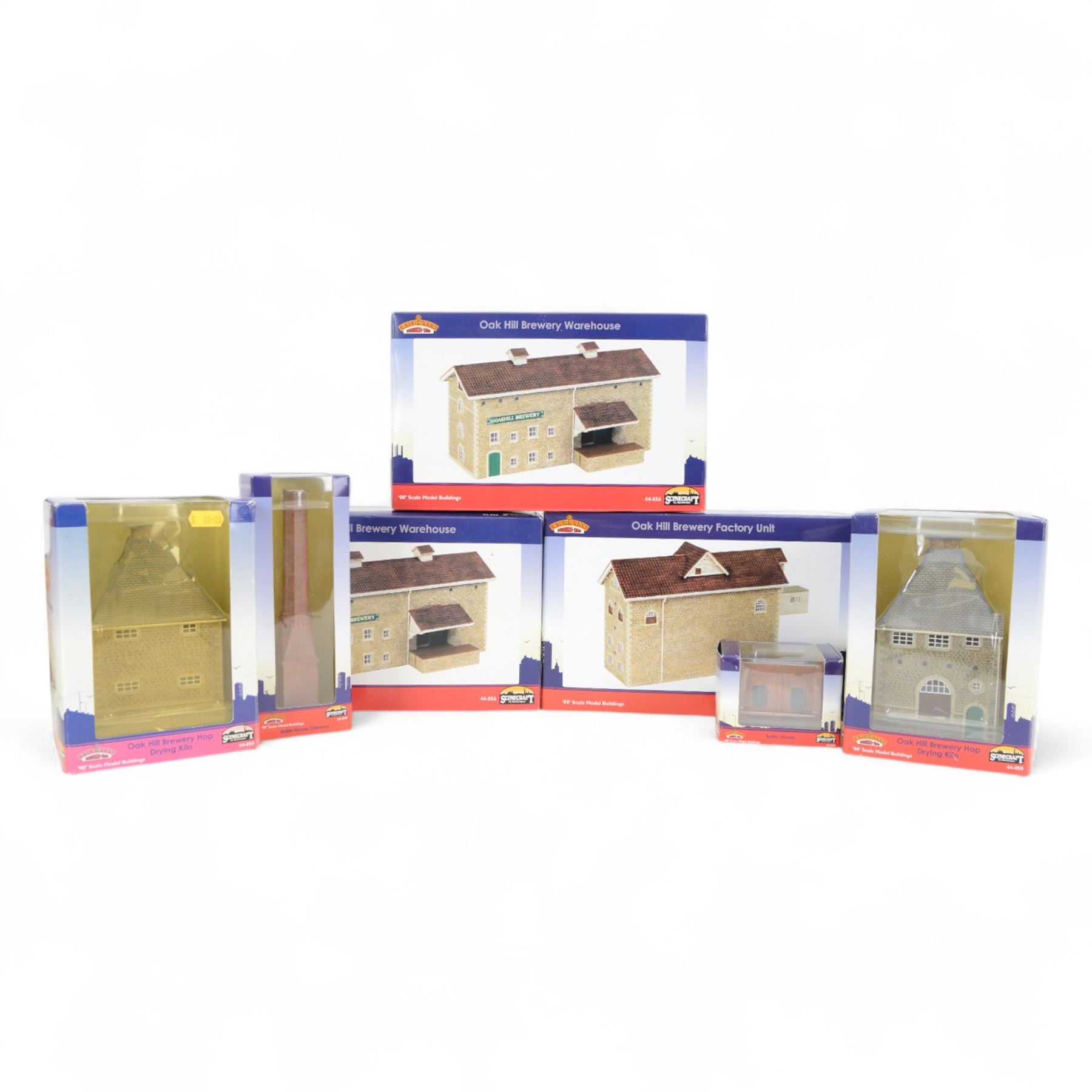Seven Bachmann Scenecraft 00 gauge 'Oak Hill Brewery' model railway trackside buildings, comprising 44057 Factory Unit, two 44056 Warehouses, two 44058 Hop Drying Kilns, 44059 Boiler House and 44060 Boiler House Chimney, all boxed