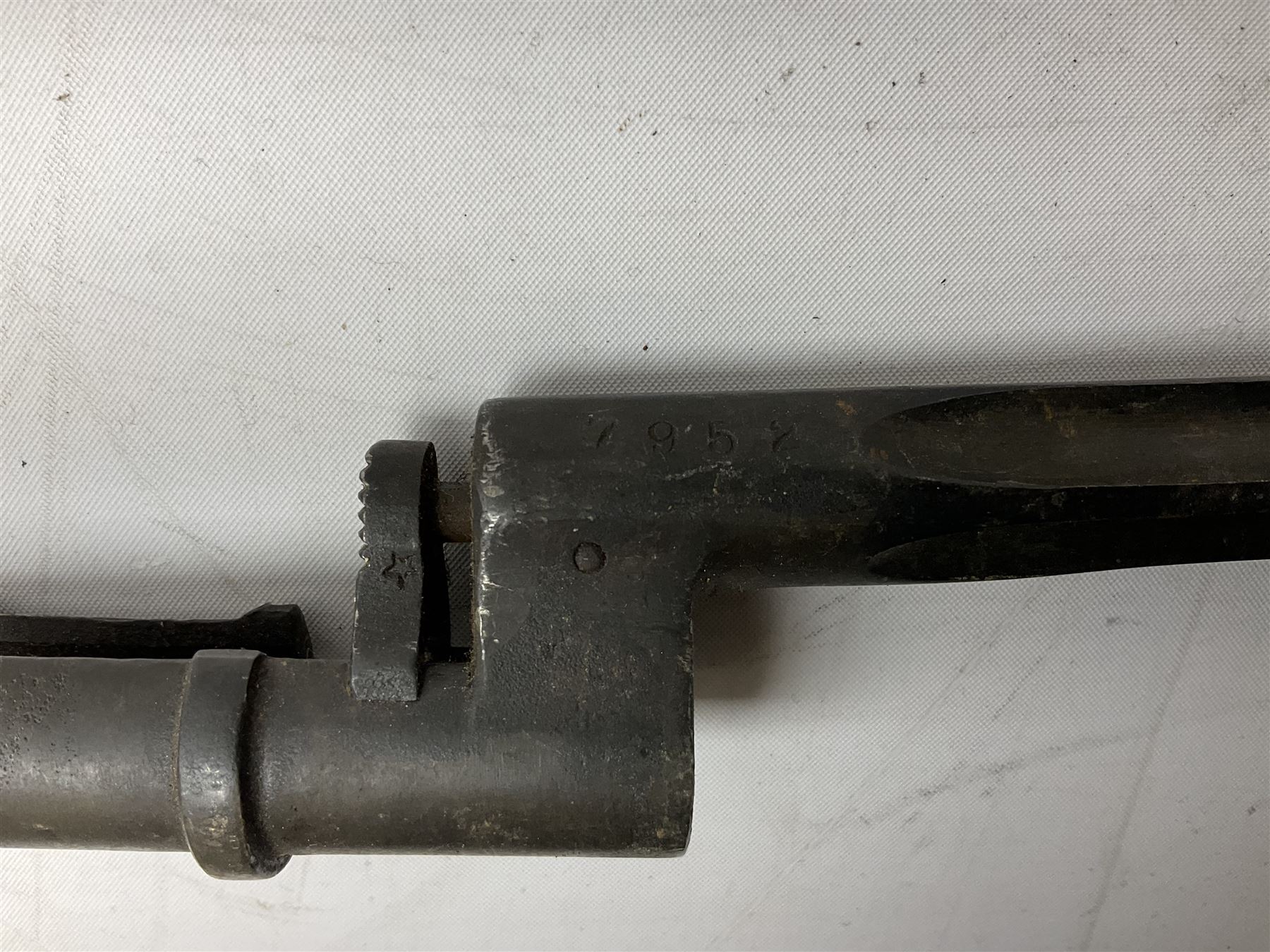 British Pattern 1876 socket bayonet with 43cm steel triangular blade L52cm overall; another socket bayonet with cruciform blade; No.4 Mk.II spike bayonet in metal scabbard with webbing frog; and 1955 Army jack knife by J.H. Thompson Sheffield (4)