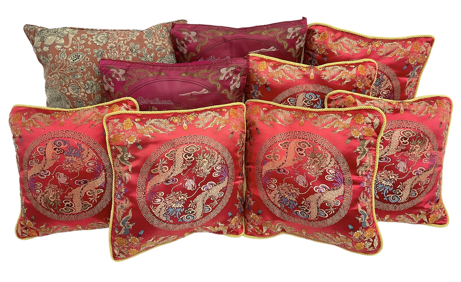 Collection of predominantly Chinese style cushions, to include feather down examples