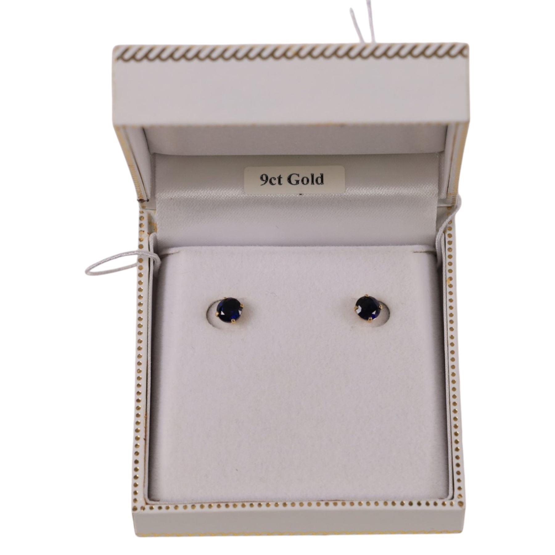 Pair of 9ct gold blue stone stud earrings, boxed