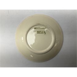 Moorcroft pin dish decorated in the Pink Magnolia pattern on a cream ground, D12cm