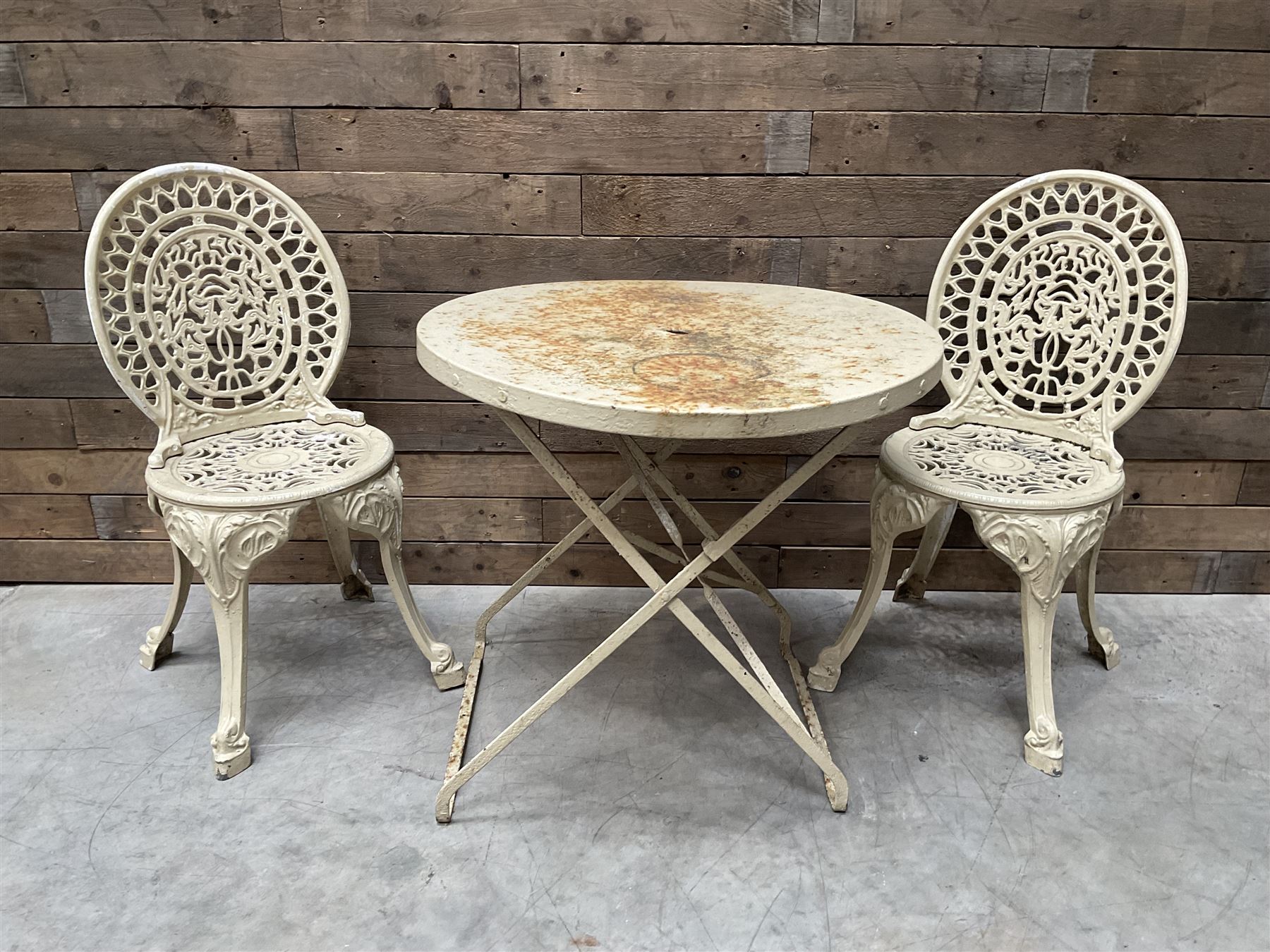 Circular cast aluminium garden table (D74cm, H68cm), and two chairs