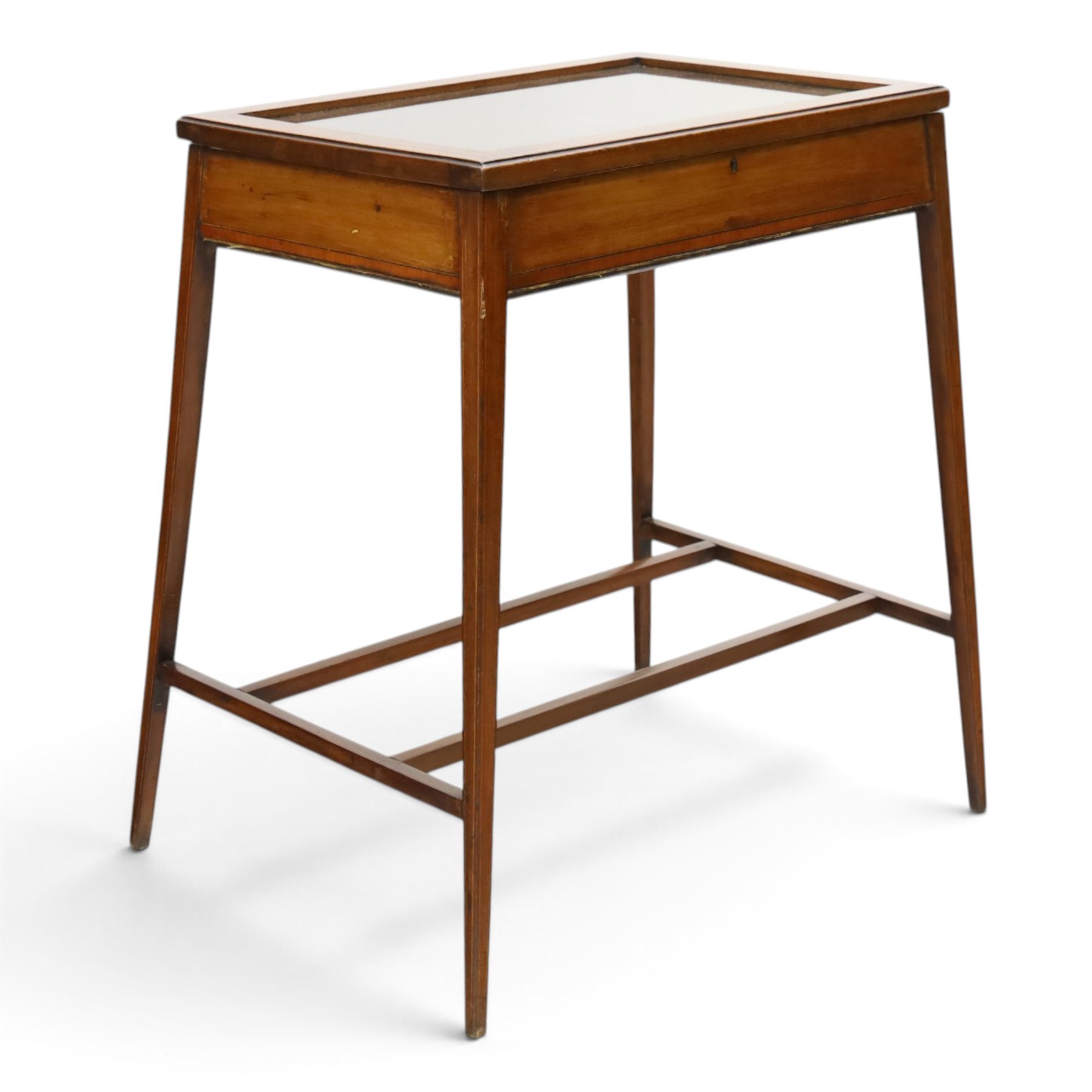 Edwardian inlaid mahogany bijouterie table of elegant proportions, rectangular hinged glazed top with mahogany banding, raised on splayed square tapering supports united by double-H stretcher