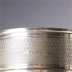 Silver cigarette box with presentation inscription, the hinged cover engraved with the crest of The Worshipful Company of Painter-Stainers W14cm London 1965 Maker Cohen & Charles and a silver napkin ring