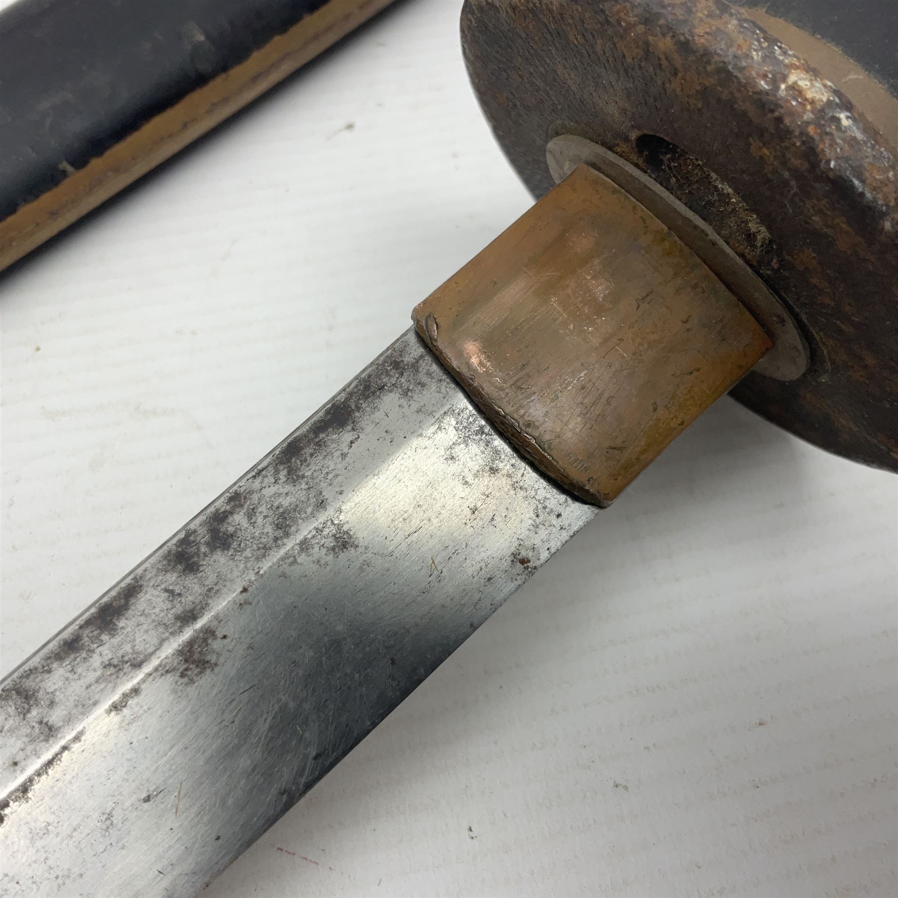 Good quality Japanese sword blade with later WWII fittings and scabbard  - 67.5cm slightly curving blade with unmarked tang, plain iron tsuba and lacquered grip with copper mounts; in lacquered wooden scabbard with tape bound tip L94cm overall