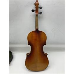 Czechoslovakian violin c1920 with 36cm two-piece maple back and ribs and spruce top, bears label 'Copy of Antonius Stradivarius Made in Czechoslovakia' L59cm; in carrying case; 1950s Czechoslovakian violin; and 195os Czechoslovakian three-quarter size violin; both cased (3)