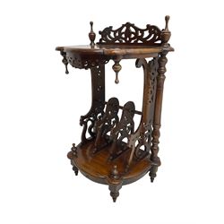 Victorian design mahogany Canterbury whatnot, the shaped top with open fretwork raised back and turned finales, under-tier with three carved and pierced divisions, flanked by turned uprights, single drawer to base, on turned tapering feet