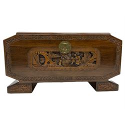 Chinese camphor and hardwood blanket box, carved with figural scenes and geometric banding, the interior fitted with sliding tray