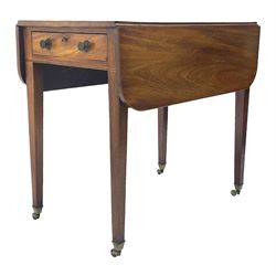 Early 19th century mahogany Pembroke table, rounded rectangular drop leaf top, single deep end drawer, on square tapering supports with brass cups and castors 