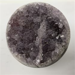 Pair of amethyst geode spheres, with purple crystalline internal formations, D9cm