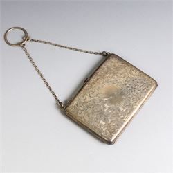 Early 20th century silver coin purse, with floral decoration and finger chain, hallmarked together with an early 20th century cigarette case,  with engraved initials, hallmarked and a silver filigree cigarette case