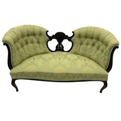 Late Victorian mahogany framed two seat settee, double fan shaped buttoned back with pierced central splat relief carved with scrolls and foliate, upholstered in pale green foliate pattern fabric, cabriole supports