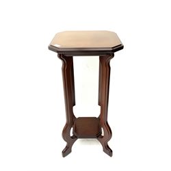 Late 20th mahogany two tier plant stand, shaped supports joined by under tier 