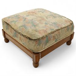 Ercol – bergère four piece suite, including armchair, two seat sofa, three seat sofa and footstool, all with removable floral upholstered cushions, the frames with side caning and rounded arm supports in stained beech

Three seat (H 87cm, D 89cm, W 196cm)
Two seat (H 87cm, D 89cm, W 137cm)
Armchair (H 87cm, D 89cm, W 87cm)
Footstool (H 28cm, D 55cm, W 55cm)