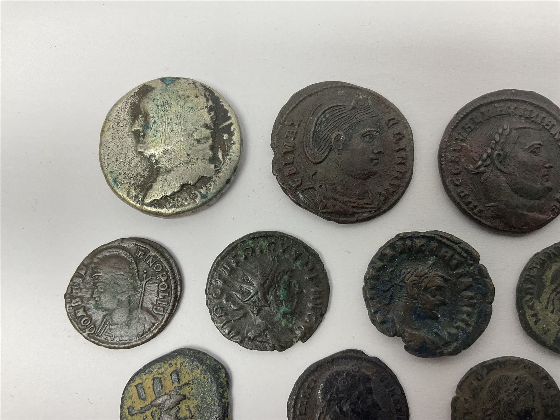 Ancient Roman Coinage, group of seventeen bronze and copper-alloy coins to include Maximianus and Galeria Valeria, along with an unidentified 76% silver round, overall weight 14g