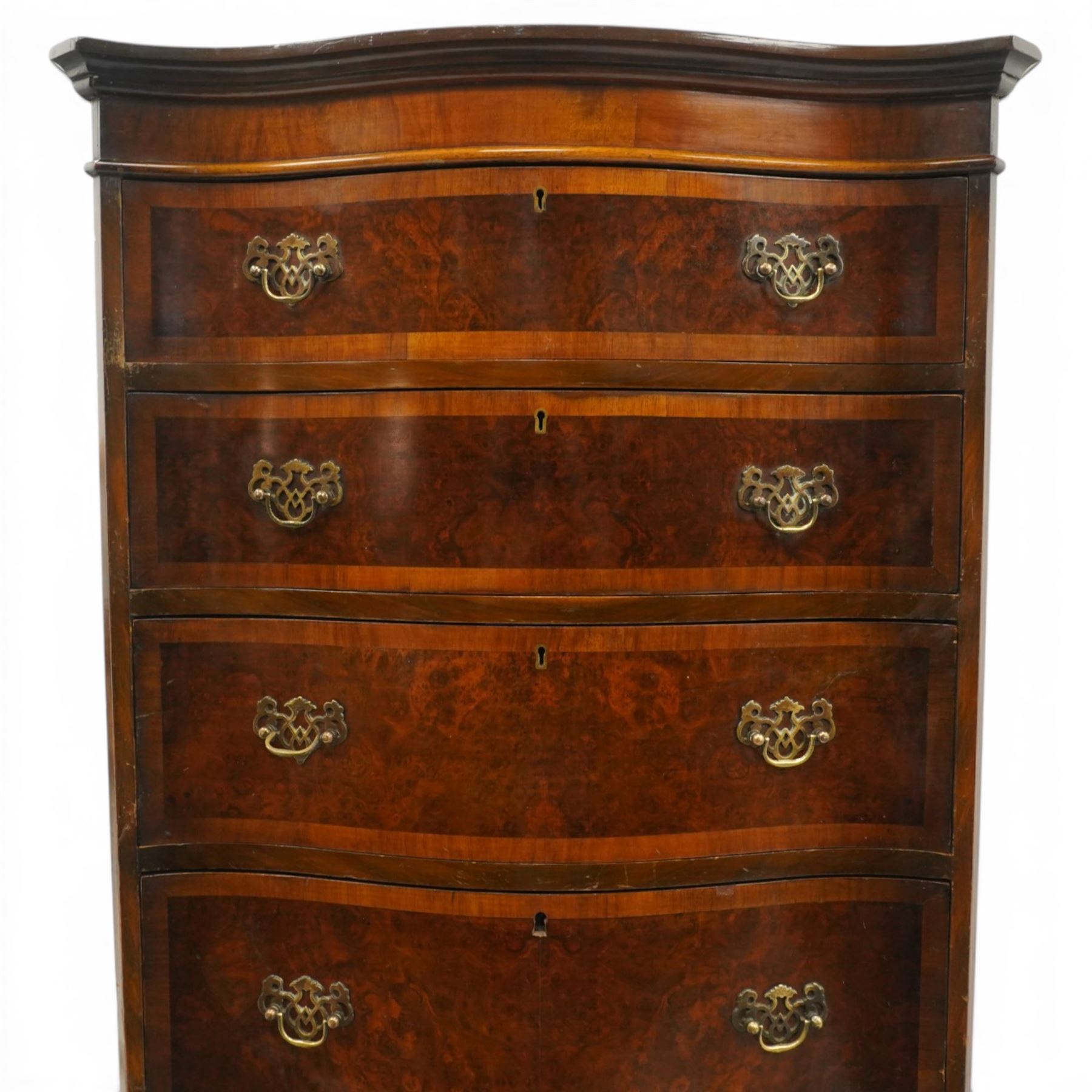 Queen Anne style burr walnut serpentine chest on chest, the upper chest with four graduating drawers with burr fronts and cross banded edges and pierced brass handles, the bottom chest with brushing slide above three graduated drawers, shaped lower apron on splayed feet 
