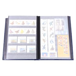 Queen Elizabeth II mint decimal stamps in one folder, face value of usable postage approximately 680 GBP