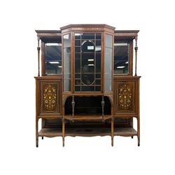 Victorian hardwood and inlaid display cabinet, central breakfront glazed display with astragal glazing and mirror back, flanked by mirrored alcoves with turned supports, below foliate and scrolling marquetry panels enclosing cupboard doors, shaped open shelves with turned supports beneath, on tapered and spade feet