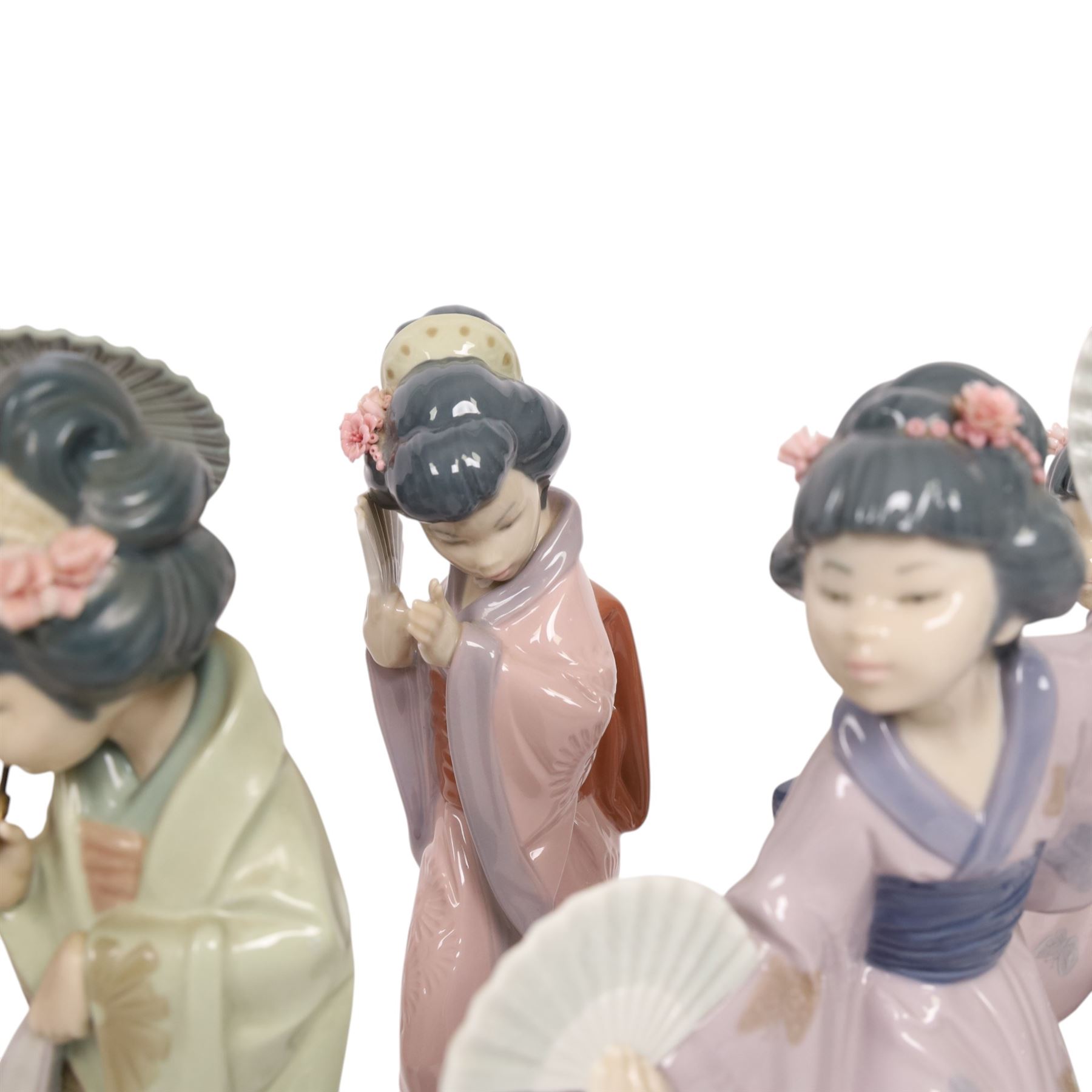 Five Lladro Japanese figures, comprising Oriental Spring no 4988, two Chrysanthemum no. 4990 and two Madame Butterfly no. 4991