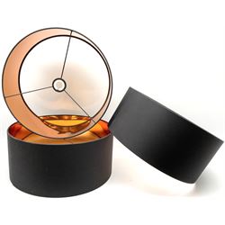 Three 'Oro' pendant drum lamp shades in black and copper, D45cm