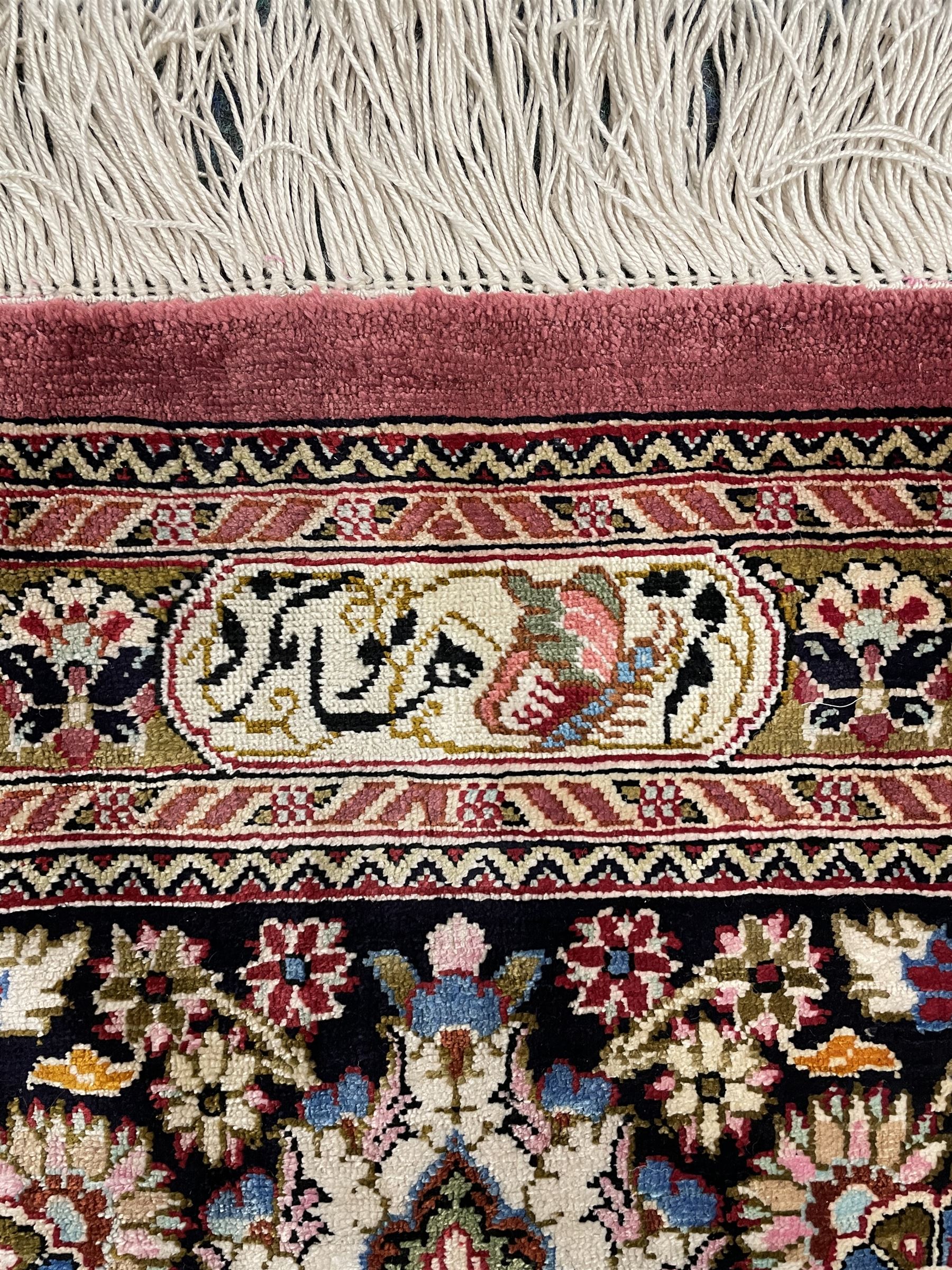 Finely knotted Persian Qom silk rug, overall pink ground with ivory