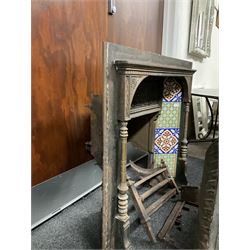 Victorian cast iron fire insert, set with ornate classical detail, brass columns and geometric tiles 