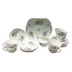 Shelley wild flowers pattern tea wares, comprising six cups and saucers, six dessert plates, one milk jug and sandwich plate