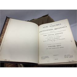Thirty six volumes of Encyclopaedia Britannica with gold tooled red leather spines in various editions 