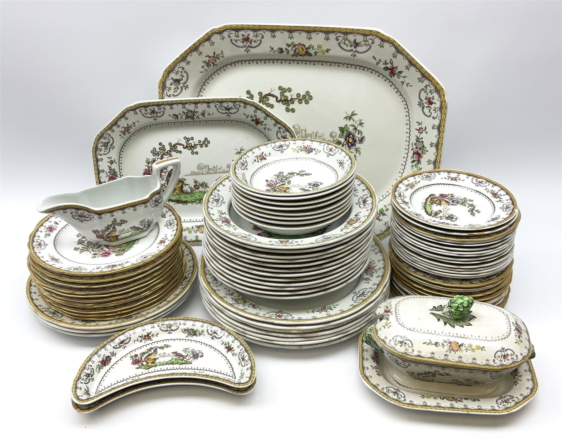 Spode Chelsea pattern dinner wares, comprising seven dinner plates, three salad plates, eleven salad plates, twenty seven side plates, twelve bowls, eight smaller bowls, pair of crescent shaped dishes, small tureen and cover and stand, sauce boat, and two platters. 